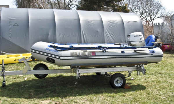  Trailer with a Sea Eagle 10.6Inflatable Boat and a Honda 9.9 Outboard