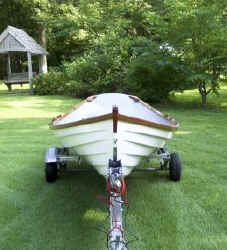 Melon Seed Rowing Skiff on Trailex SUT-500-S Trailer